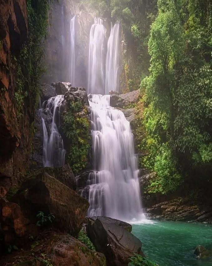 Waterfall surrounded by rainforest in Costa Rica