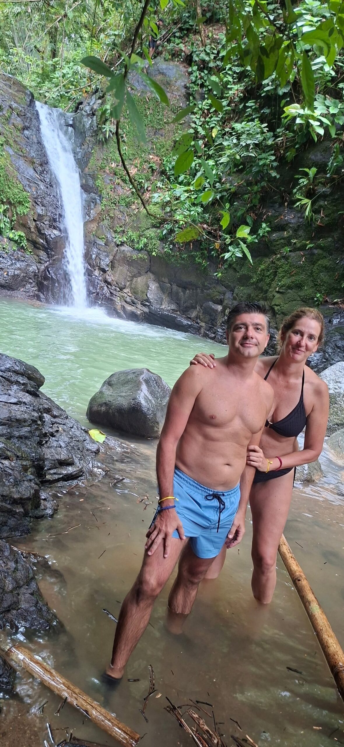 Waterfall surrounded by tropical rainforest in Costa Rica