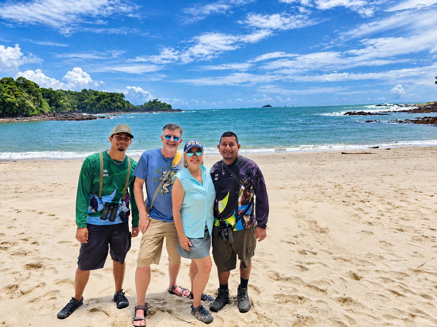 Guests with their local guides on the beach at Manuel Antonio