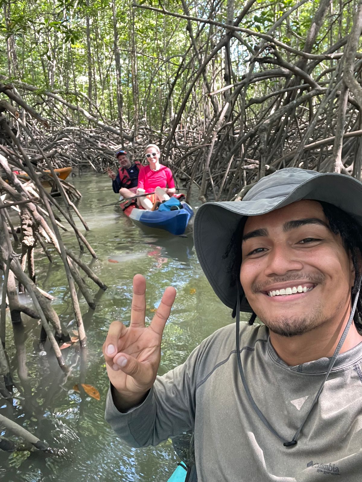 Naturaleza Pura Vida guide with guests in the Costa Rica mangroves